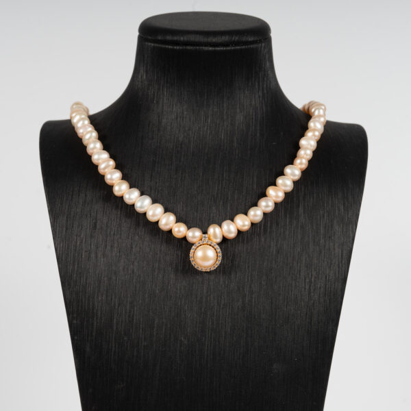 Vòng Ngọc Trai Hồng Kết Hợp Mặt Bạc NP1079