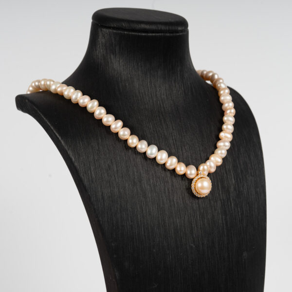 Vòng Ngọc Trai Hồng Kết Hợp Mặt Bạc NP1079