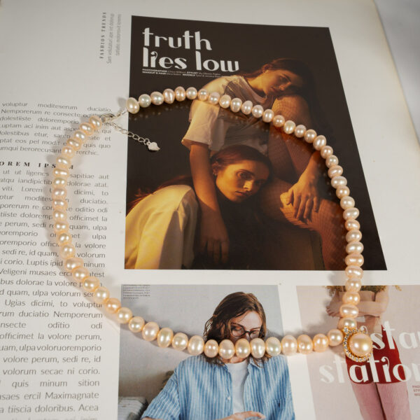 Vòng Ngọc Trai Hồng Kết Hợp Mặt Bạc NP1079