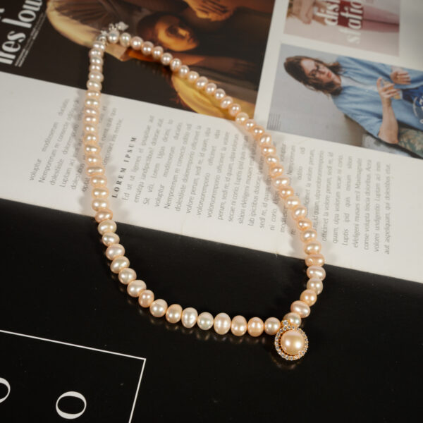 Vòng Ngọc Trai Hồng Kết Hợp Mặt Bạc NP1079